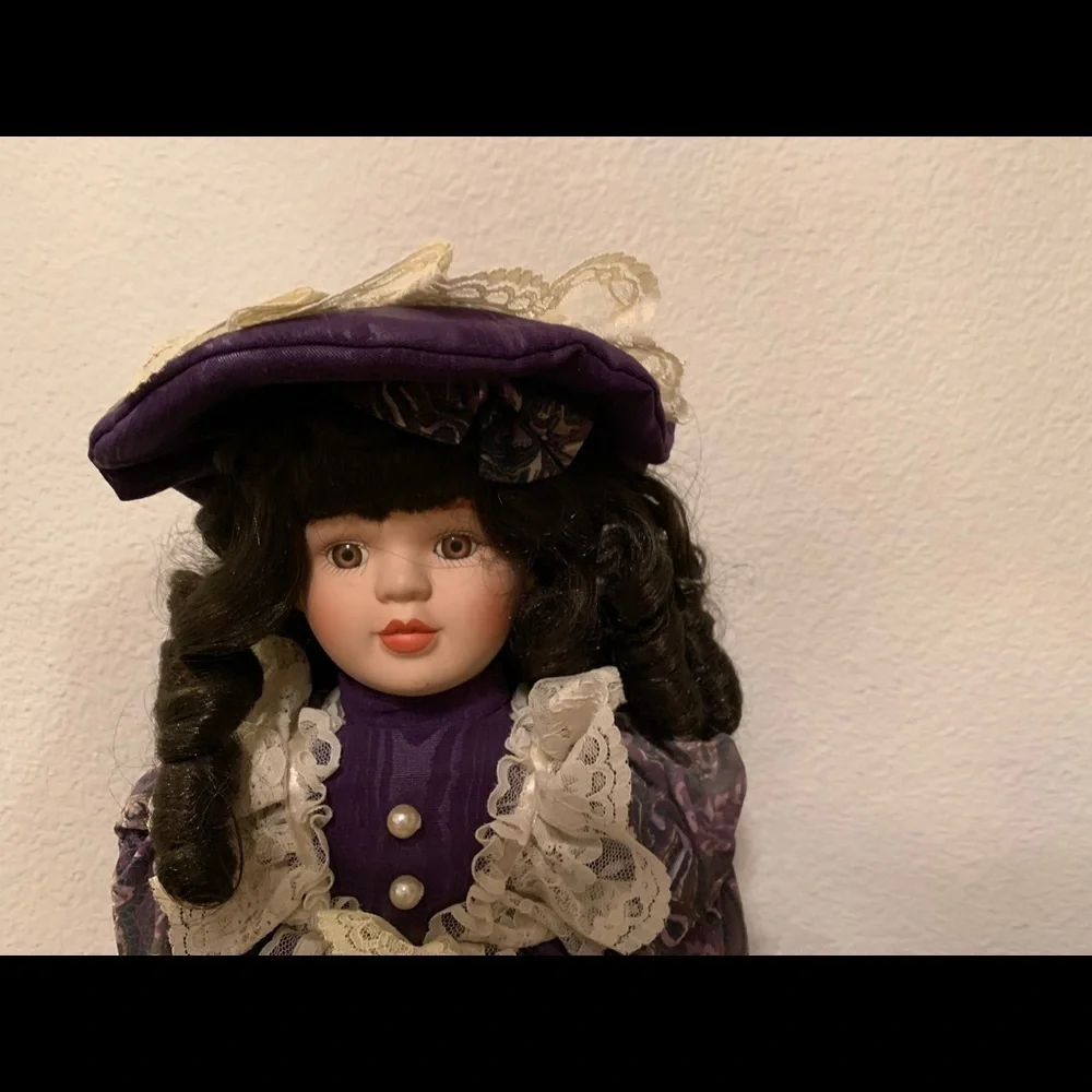 Elegant Purple and Cream Doll